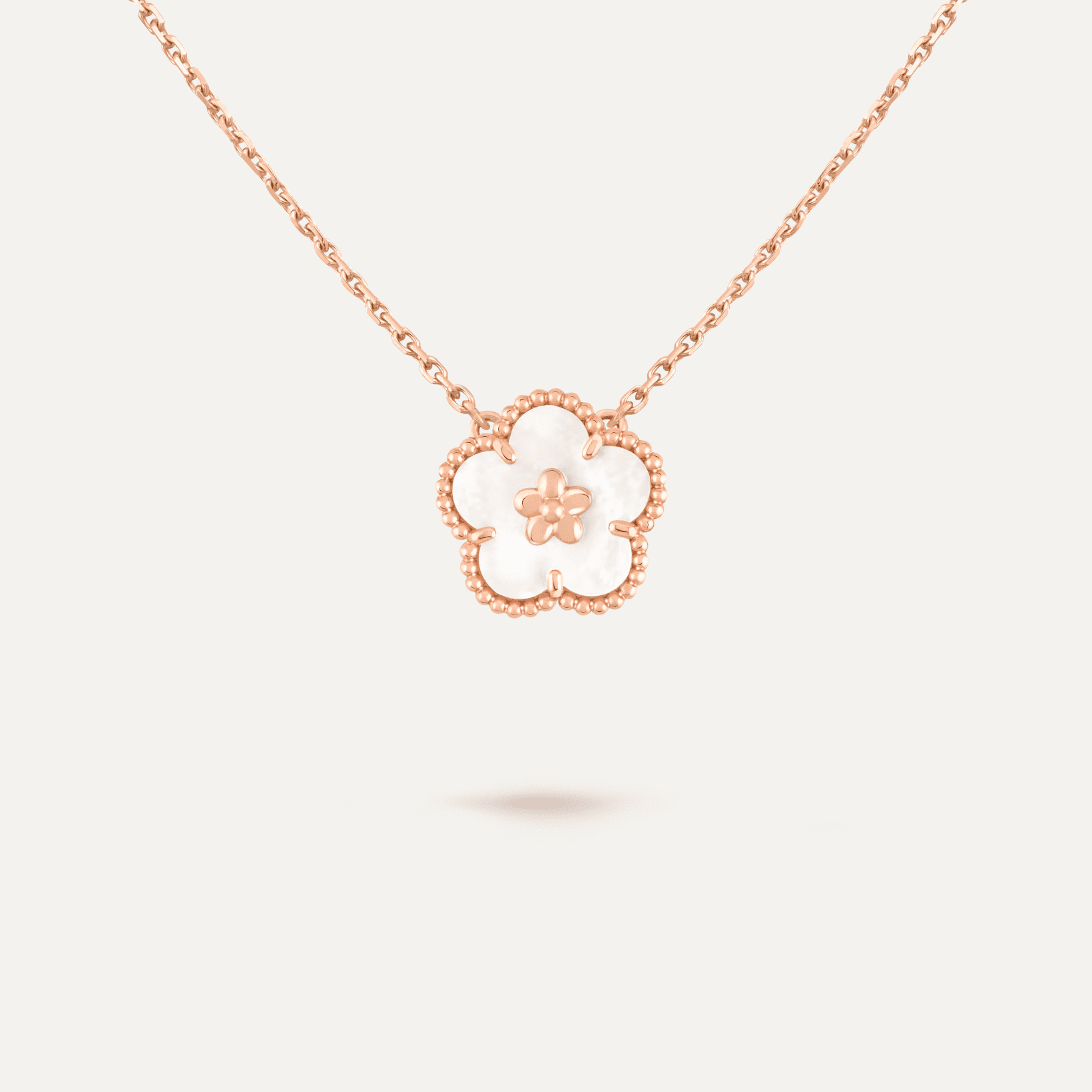 Van Cleef & Arpels Lucky Spring pendant, plum blossom