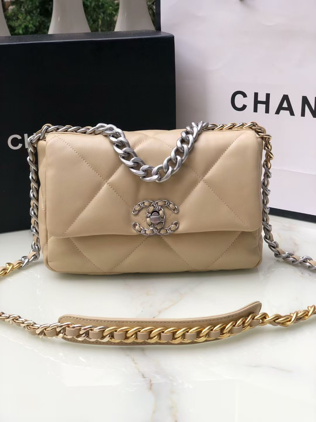 CHANEL 19 HANDBAG Shiny Leather, Gold-Tone, Silver-Tone Ruthenium-Finish Metal Beige 26x16x9cm