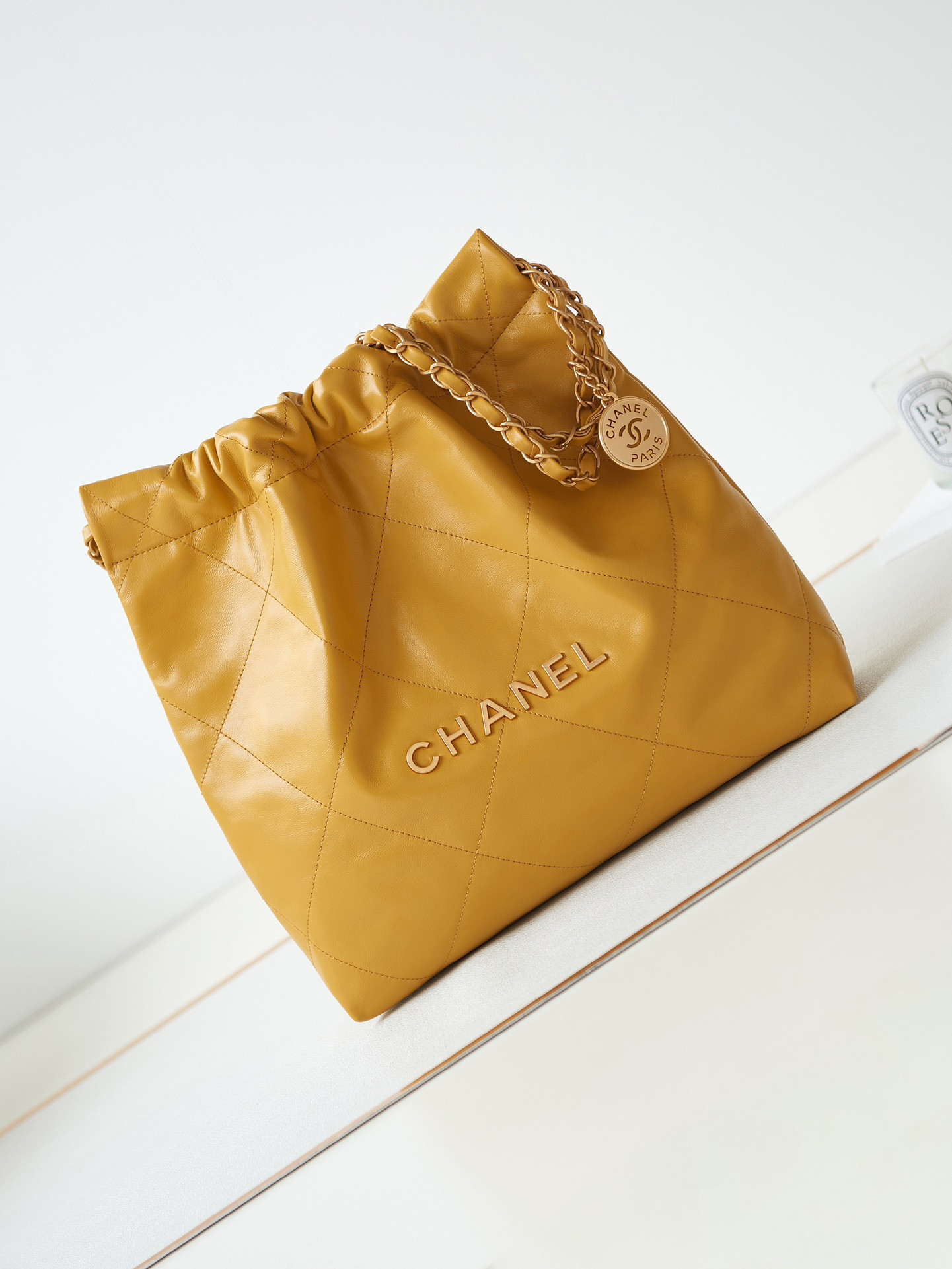 CHANEL 22 SMALL HANDBAG Shiny Calfskin YELLOW 13.7*14.4*2.7 in