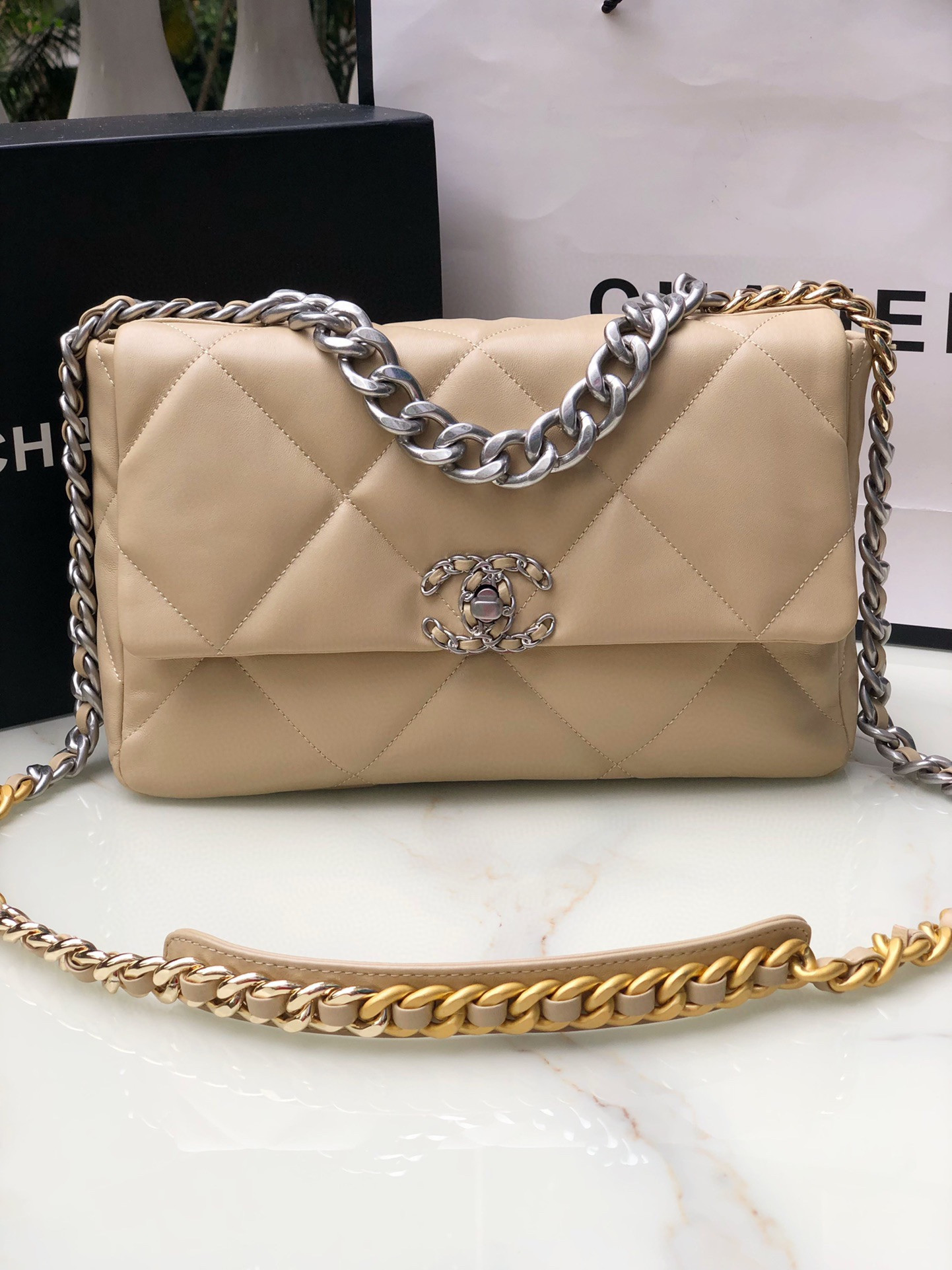 CHANEL 19 HANDBAG Shiny Leather, Gold-Tone, Silver-Tone Ruthenium-Finish Metal Beige 30x20x10cm
