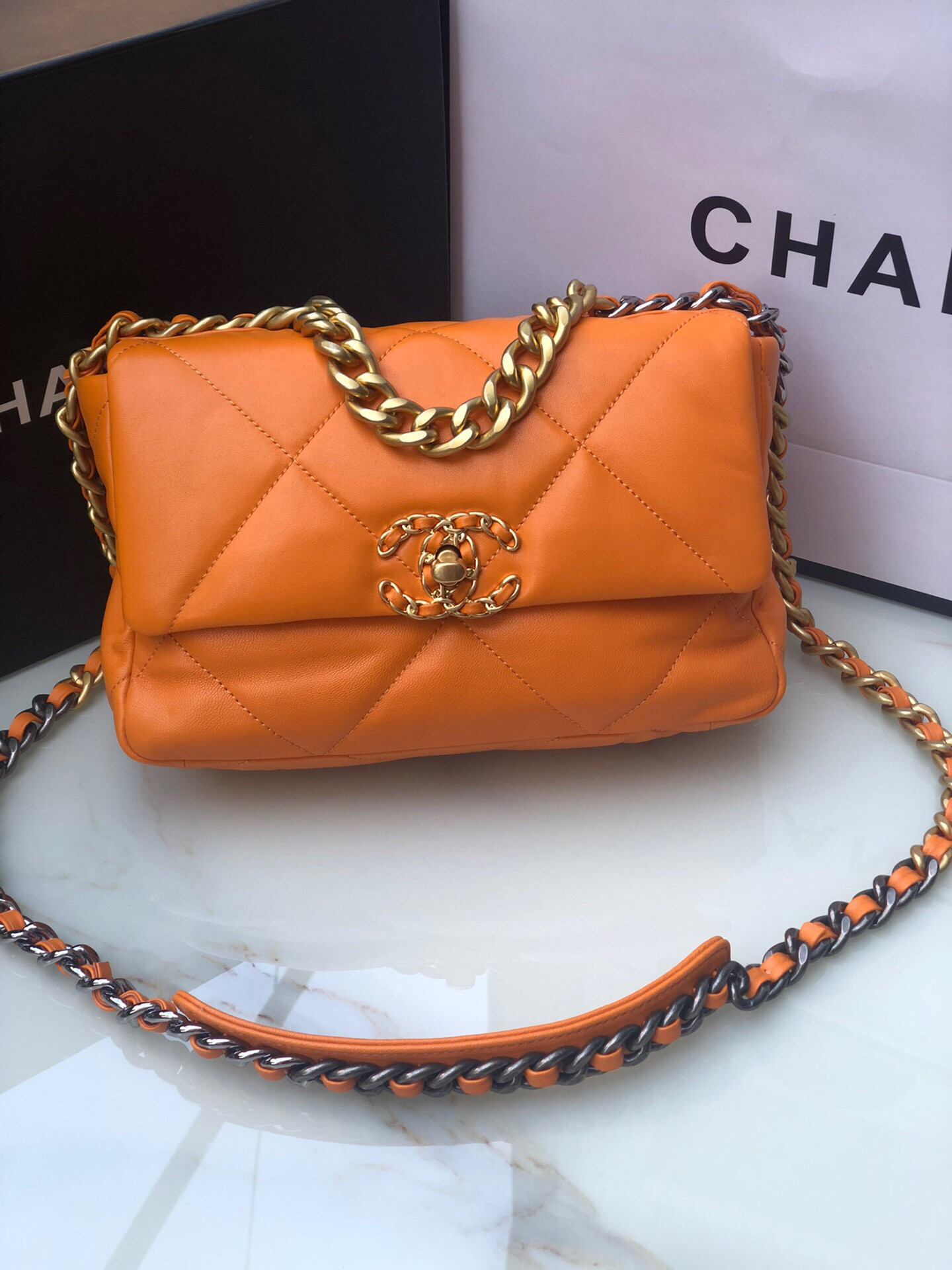 CHANEL 19 HANDBAG Shiny Leather, Gold-Tone, Silver-Tone Ruthenium-Finish Metal Orange 6.2 * 10.1 * 3.5 in