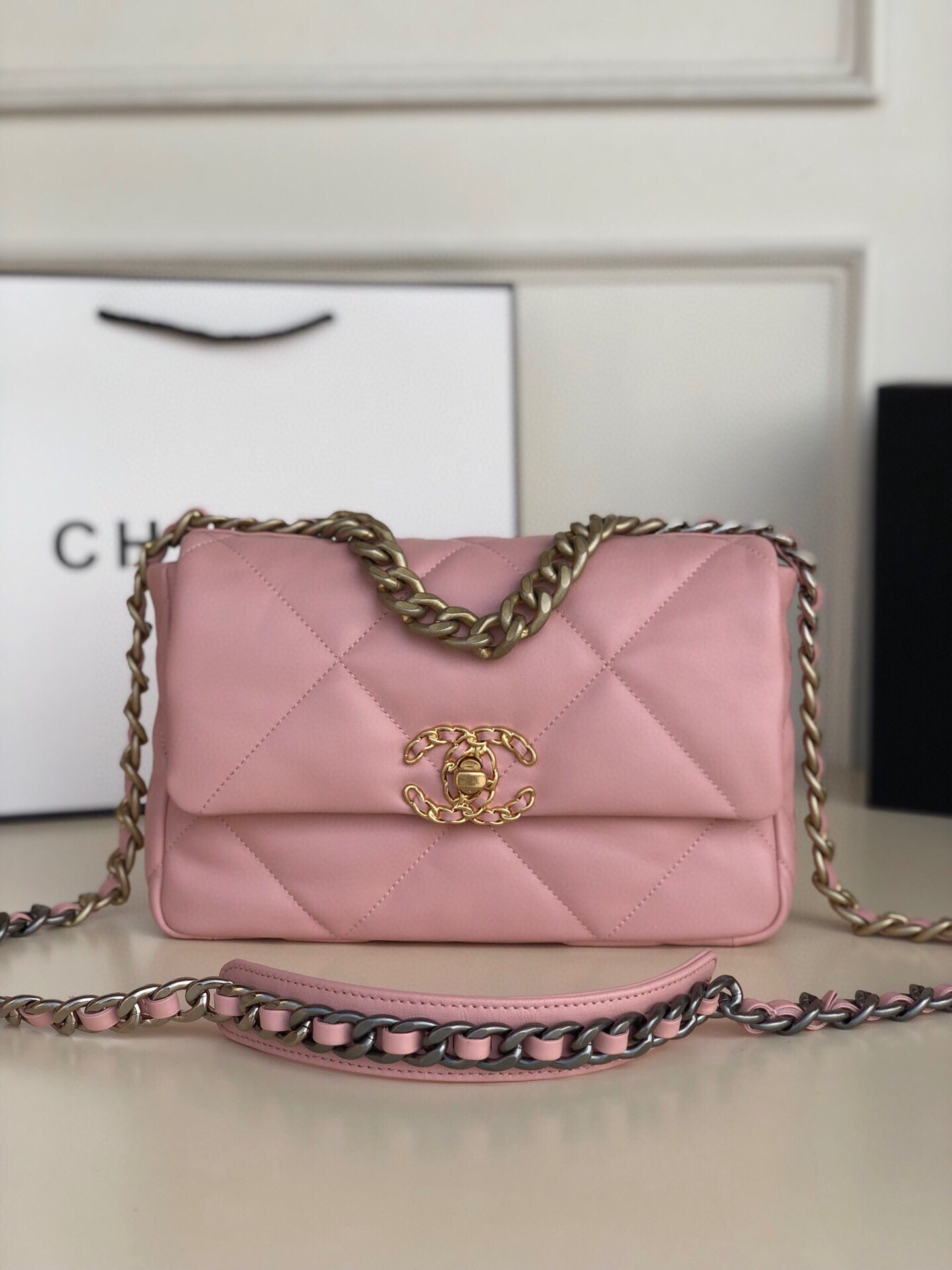 CHANEL 19 HANDBAG Shiny Leather, Gold-Tone, Silver-Tone Ruthenium-Finish Metal Light Pink 6.2 * 10.1 * 3.5 in