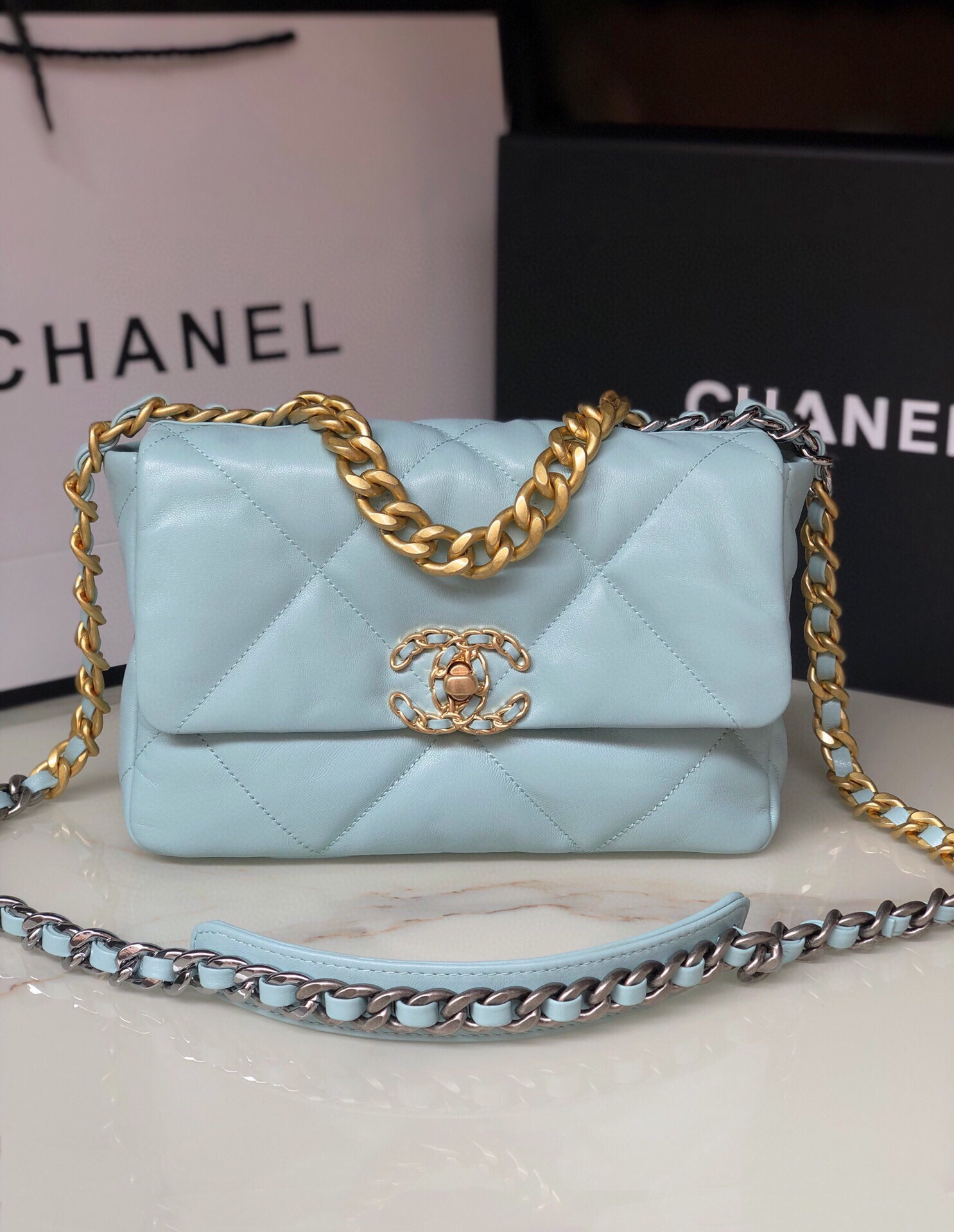 CHANEL 19 HANDBAG Shiny Leather, Gold-Tone, Silver-Tone Ruthenium-Finish Metal Light Blue 6.2 * 10.1 * 3.5 in