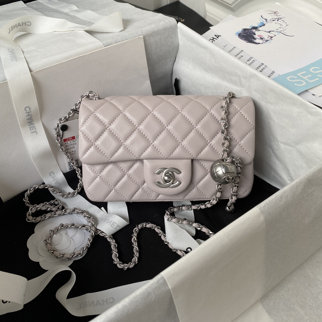 CHANEL MINI FLAP BAG SHINY CALFSKIN SILVER-TONE METAL LIGHT PINK 4.7 × 7.8 × 2.3 in