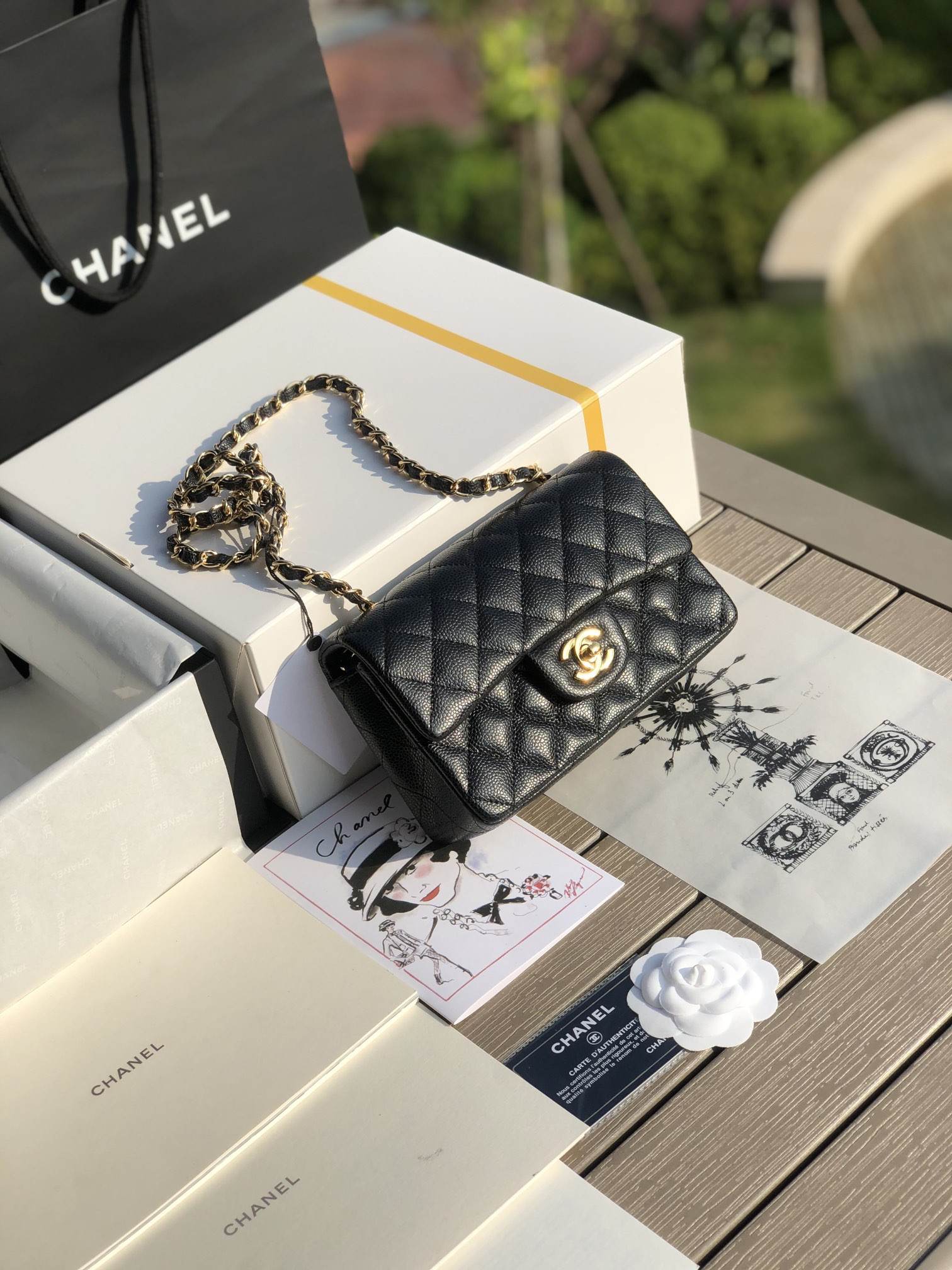 CHANEL MINI FLAP BAG BLACK WITH GOLD-TONE MENTAL 4.7 × 7.8 × 2.3 in - Image 2