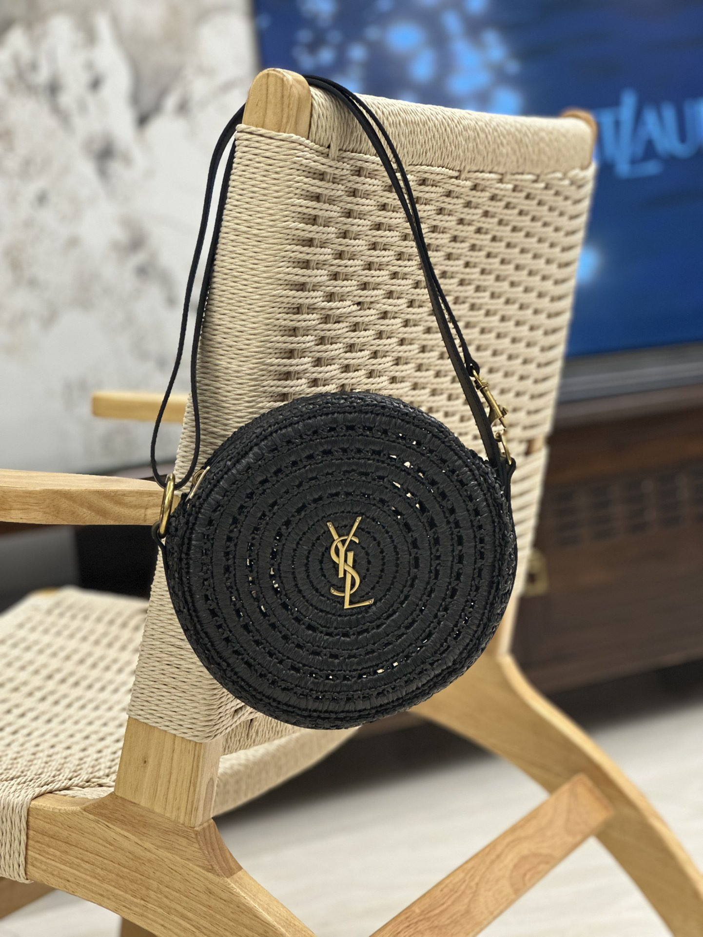 YSL ROUND BAG IN RAFFIA AND VEGETABLE-TANNED LEATHER Color Black