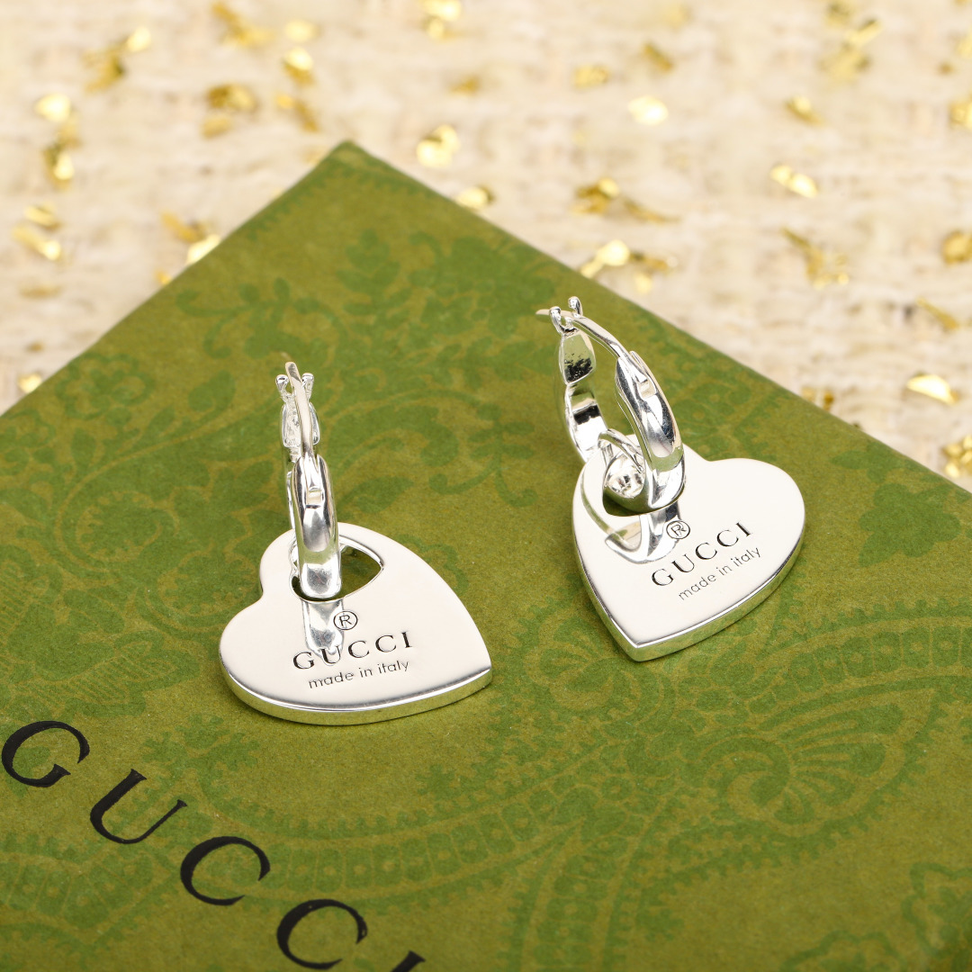 Gucci Trademark Collection Heart Diamondless Earrings.