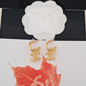 Chanel Double C Classic Accessories Collection Half-Diamond Earrings.