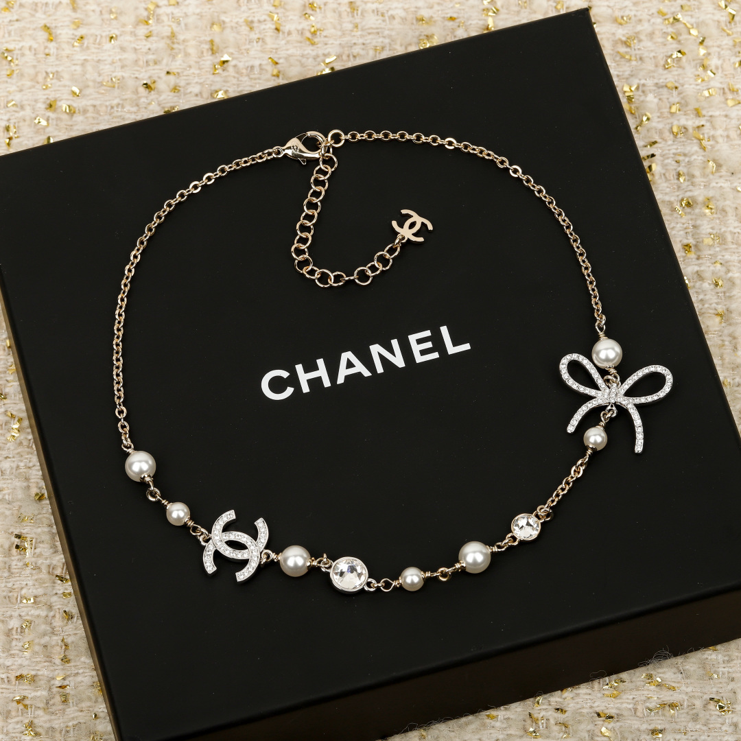 Chanel Bow Pearl Double C Diamond Necklace.