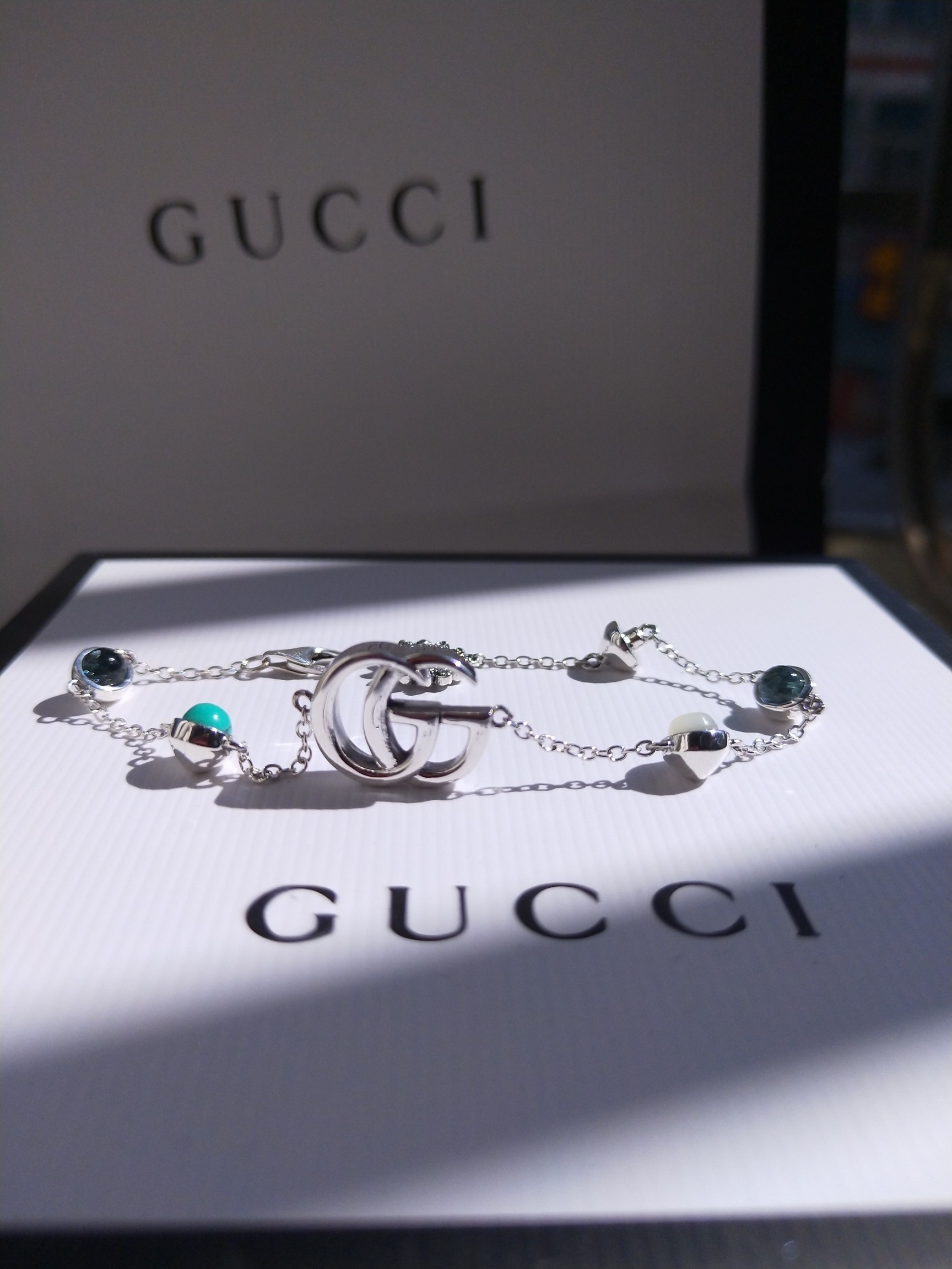 Gucci Jewelry Bracelets  Turquoise bracelet with a daisy flower at the tail