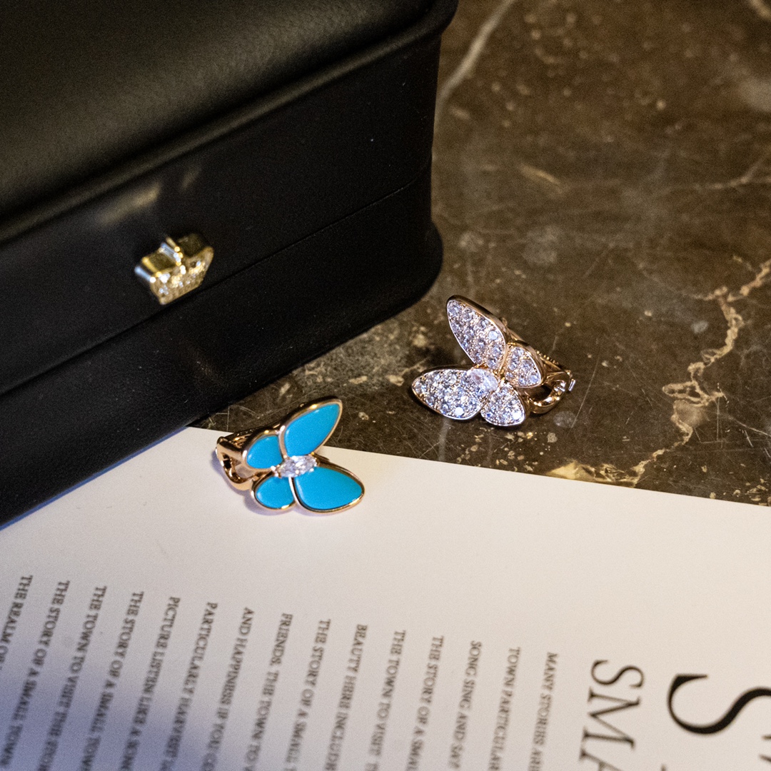Van Cleef & Arpels Asymmetric Butterfly Earrings. - SUPER-MIRROR