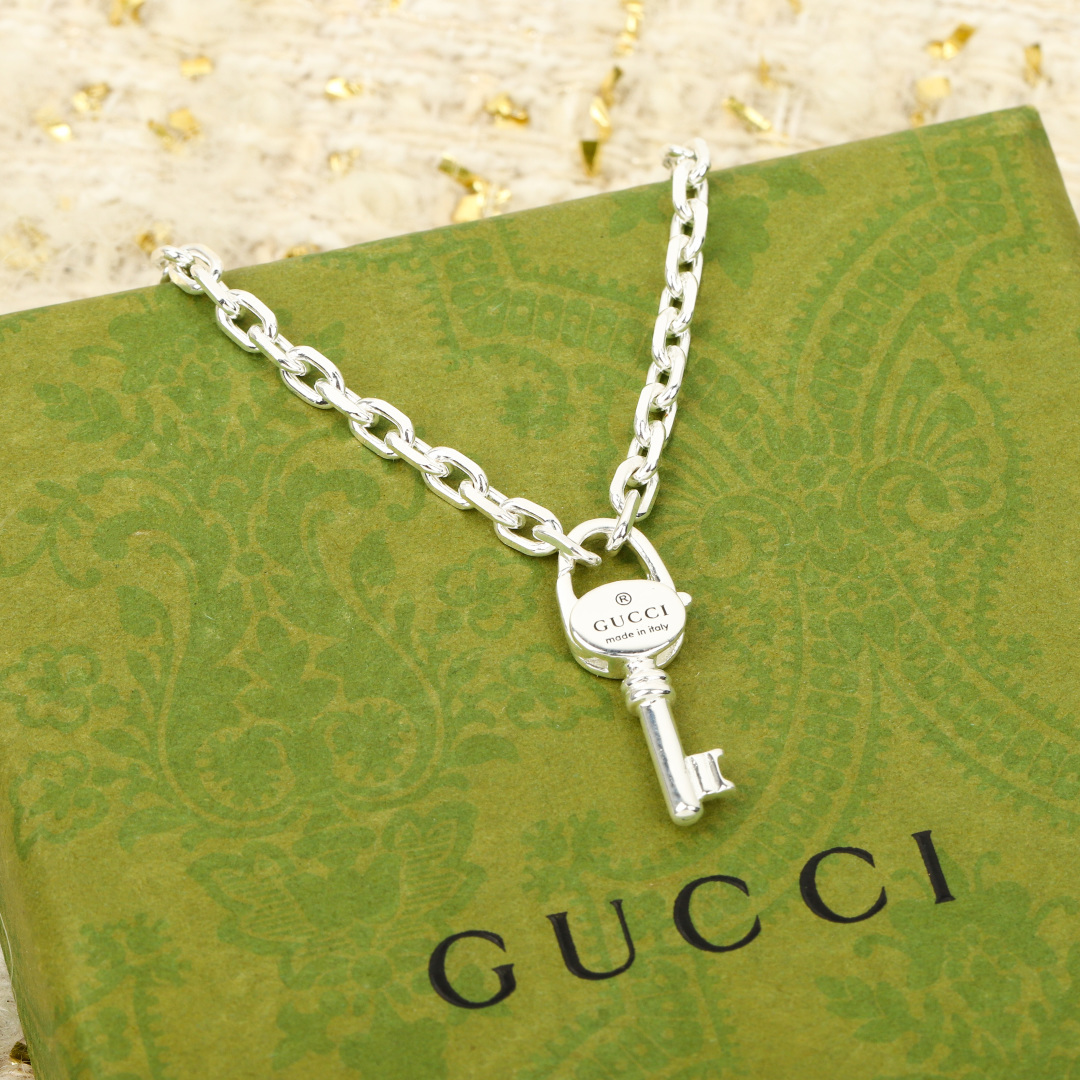Gucci Trademark Collection Key Pendant Necklace.